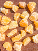 Load image into Gallery viewer, Orange Calcite Rough Pocket Stone
